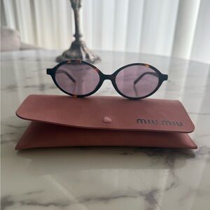 Miu Miu sunglasses with Tinted Lenses